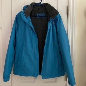 Land’s End winter jacket. Turquoise with grey flannel lining.Size large